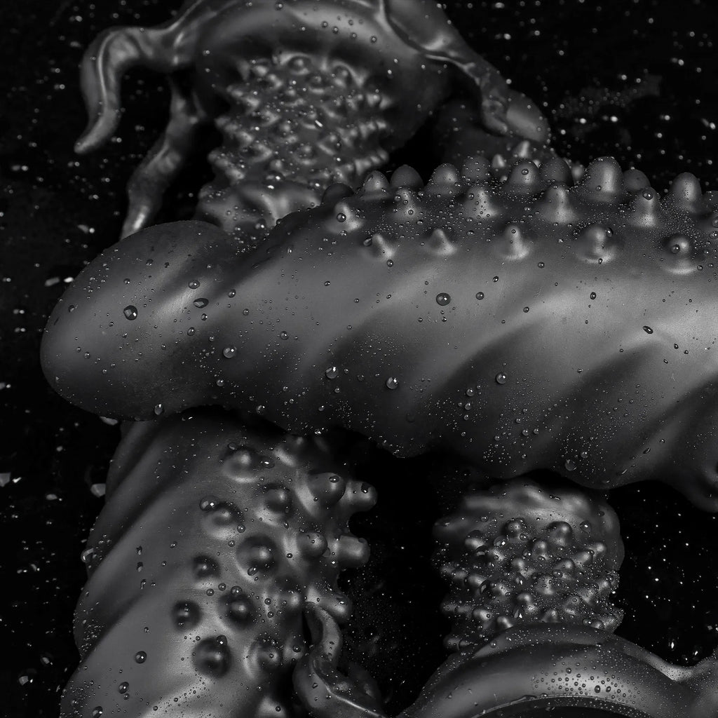 Black "Abyss" Spiked Fantasy Dildo by Oieffur, made of platinum silicone, featuring a textured, monster-style design for intimate use.